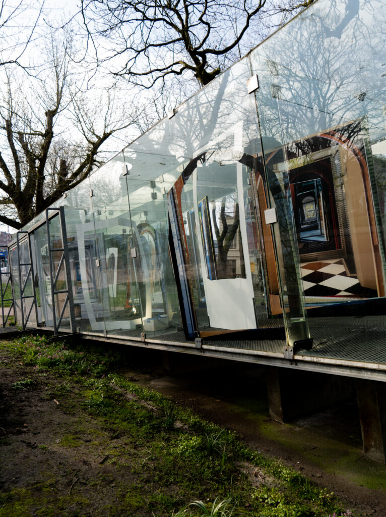 glass pavilion with photo frames, artwork in public space